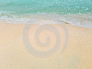 Soft blue waves on a clean sandy beach. travel photos