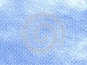 Soft blue wrapping paper texture.