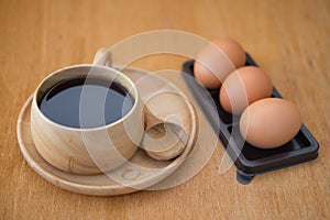 Soft-boiled egg with hot coffee