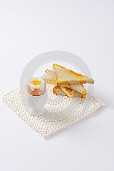 Soft boiled egg and toasts