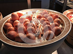 Soft boiled eggs presentation in hotel breakfast buffet.