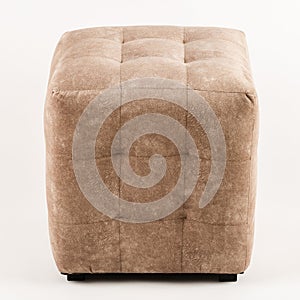 Soft brown pouf on a white background