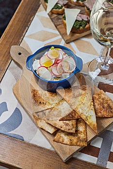 Soft cheese appetizer for wine on the table