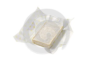 Soft cheese with thin white rind photo