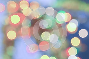 Soft colored Christmas bokeh light abstract holiday background.