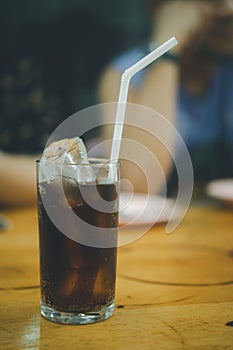 Soft drink in glass with ice on table at Thai local restaurants