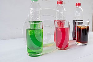 Soft drink in a glass on a white background