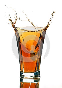 Soft drink with a splash isolated on white