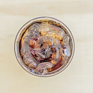 Soft drinks in glass with ice