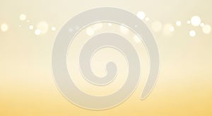 Soft Yellow and White Bokeh Lights on a Gradient Background