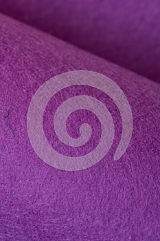 Soft felt textile material royal purple colors, colorful texture flap fabric background