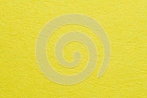 Soft felt textile material yellow color, colorful texture flap fabric background