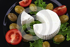 Soft feta cheese with tomato olives