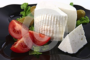 Soft feta cheese with tomatoes