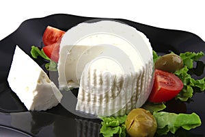 Soft feta cheese with tomatoes