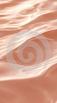 Soft, flowing water surface reflecting light in warm tones