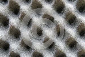 Soft foam soundinsulation pattern as background, texture close-up