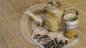 Soft focus image of coffee beans and coffee cups set.