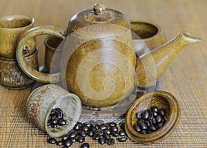 Soft focus image of coffee beans and coffee cups set.