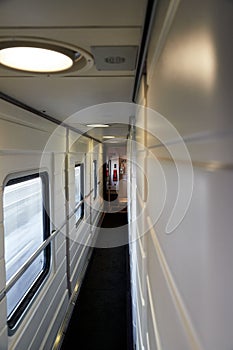 soft focus of interior of the corridor of the train car