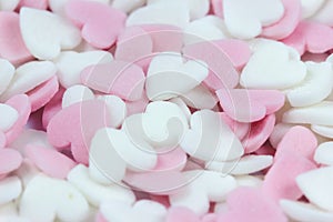 Soft focus pink and white heart candy pastel background for Valentines day