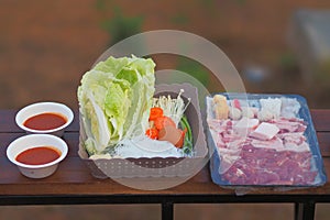 Soft focus to Raw Meat and Vegetables with Moo katha pan for outdoor party in Garden