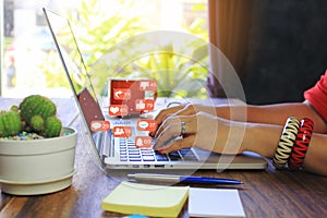 Soft focus of young woman of freelancer working using laptop computer in coffee shop, Communication technology and Business