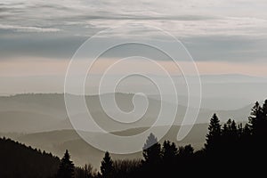 Soft fog in the mountains during sunset