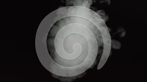 Soft Fog in Slow Motion on Dark Backdrop. Realistic Atmospheric Gray Smoke on Black Background. White Fume Slowly