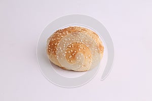 Soft and fresh sesame bun on a white background