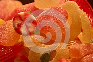 Soft fruit candies in granulated sugar coated form