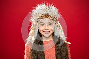 Soft furry accessory. Tips for caring for fur garments. Child long hair soft hat enjoy softness. Winter fashion concept