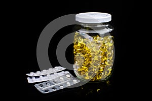 Soft gel capsule in glass bottle