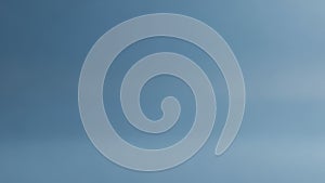 Soft gradient of muted blue and grey tones creating a smooth abstract background with subtle light variations