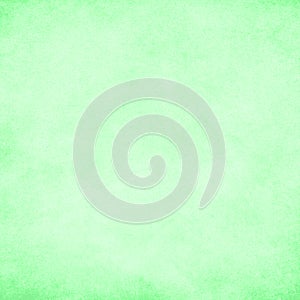 Soft green, subtle grunge paper texture background. Darkened edges.