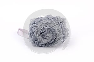 Soft grey bath puff or sponge isolated on white background