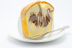 Soft homemade marble butter cake on white background