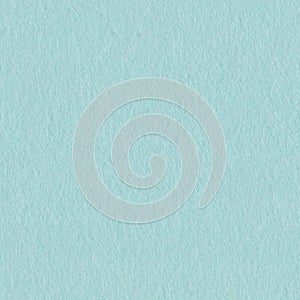 Soft light blue felt texture. Seamless square background, tile ready.