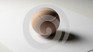 A soft light, the object casts a shadow on the surface, emphasizing