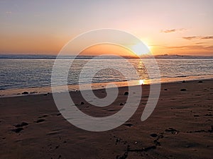 Soft light of sunset on l\'Hermitage, Beach of Saint Gilles