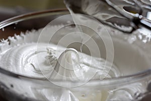 Soft meringue peaks freshly whisked photo