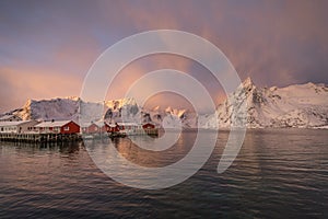 Soft and mysterious morning sunrise light over the Hamnoy island and mountain chains, Lofoten