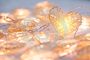 Soft pastel Orange Lamp in Bamboo baskets in the heart shape