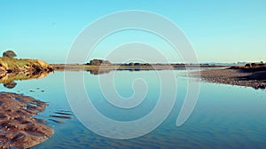 Soft Pastel Reflections in a Shallow Tidal Lagoon