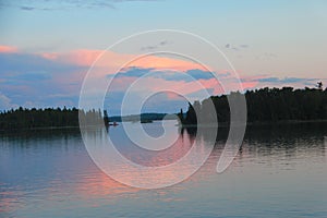 Soft peach toned sunset, Lake of the Woods, Kenora, Ontario photo