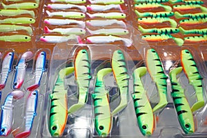 Soft plastic fishing baits in boxes