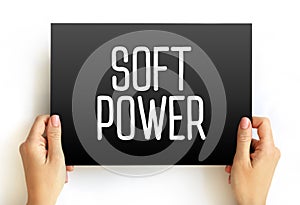 Soft power - ability to attract co-opt rather than coerce, text concept on card