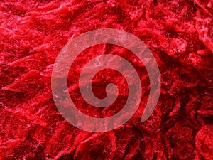 Soft red plush, textil plush texture photo