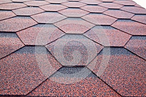 Soft roof, roof tiles. Flexible shingles, Roof tiling texture. photo