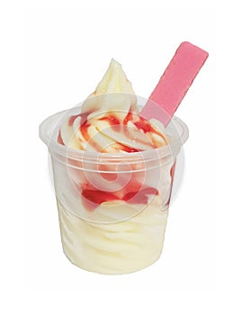 Soft serve ice cream in a cup with topping